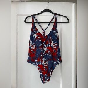 Red, blue and white tie dye one-piece